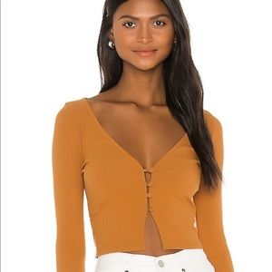 Cute fall knit top with button details. Unworn.